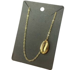 Gold seashell necklace